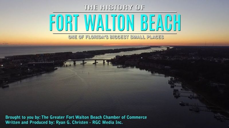 The History of Fort Walton Beach title over an aerial of the sound at dusk